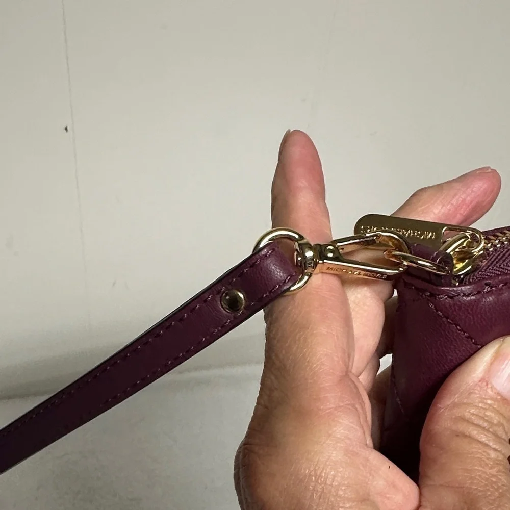 Michael Kors Plum Quilted Wristlet/ wallet
